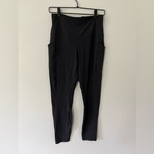 Womens Lululemon black leggings….never worn!  Size 10